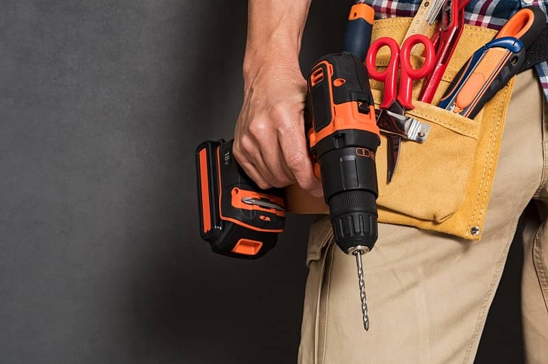 Hand holding construction tools -cm