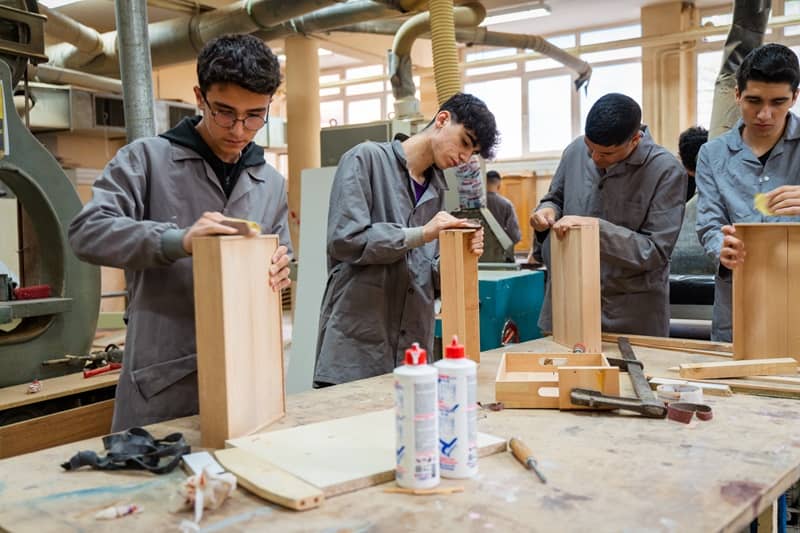 Carpentry Workshop With Students Studying For Apprenticeship At High School-cm