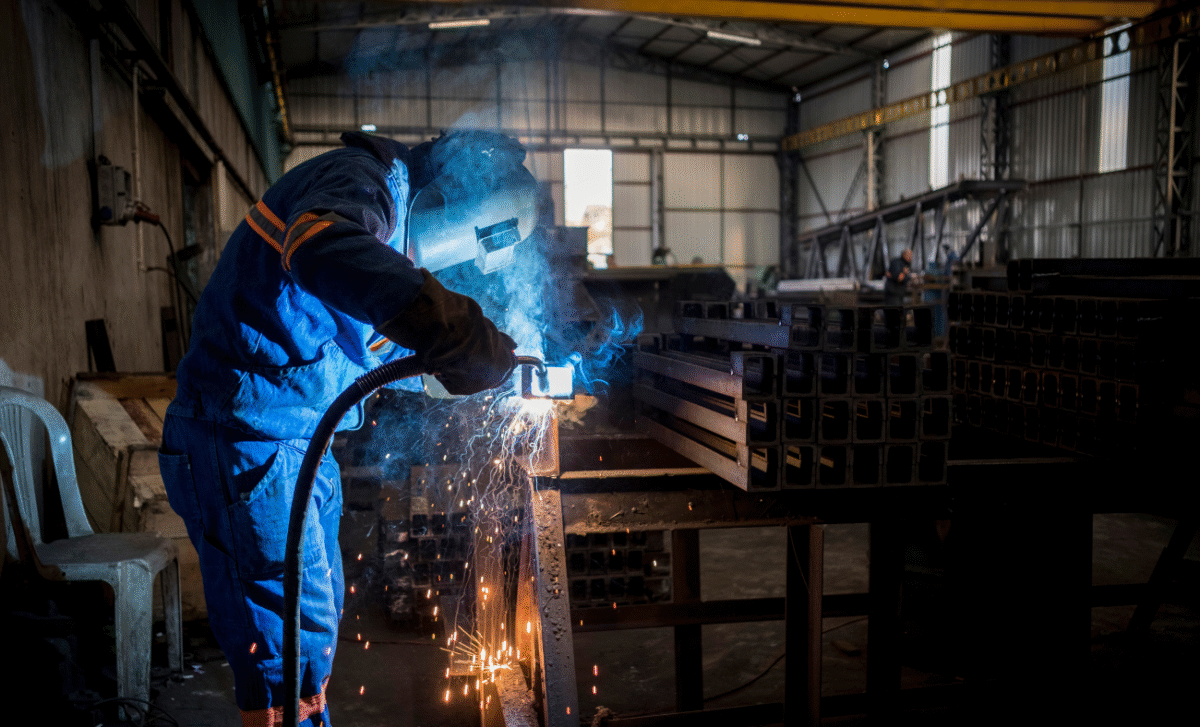 Hiring welders: skilled professional performing welding on a construction project